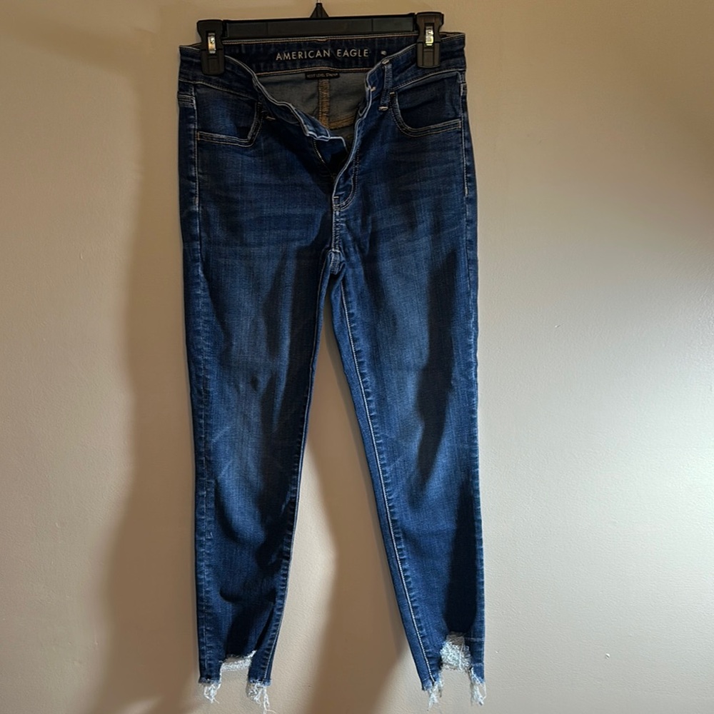 American Eagle Outfitters Blue Skinny Jeans with Distressed Hem